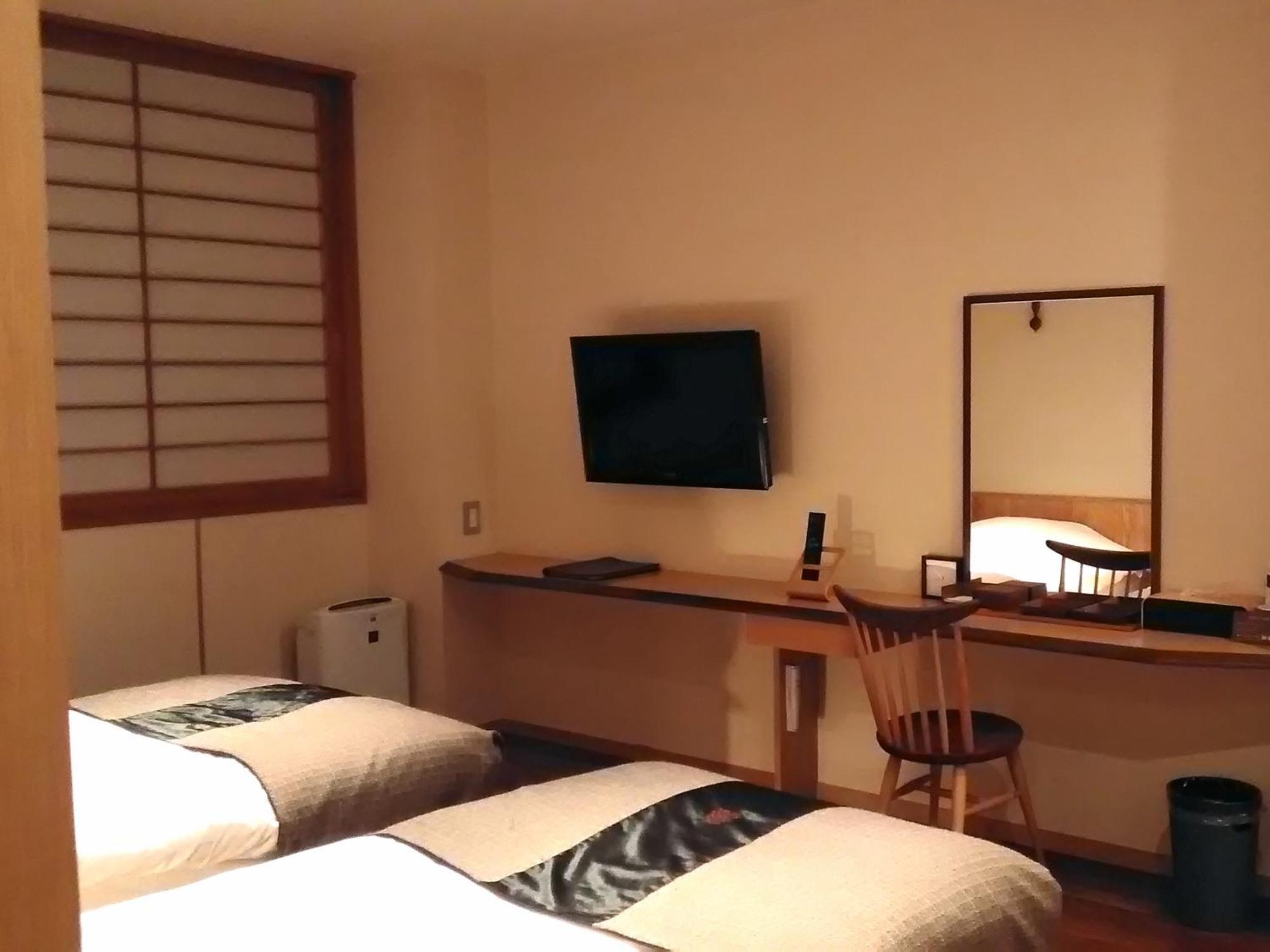 Niseko Konbu Onsen Tsuruga Moku-No-Sho Hotell Rom bilde